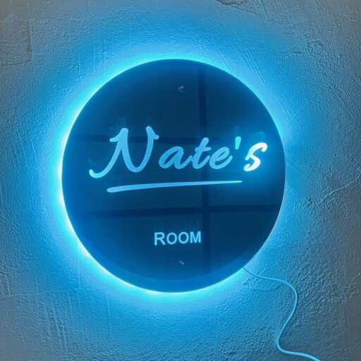 Generic Custom Personalized Name Mirror LED Light in a living room